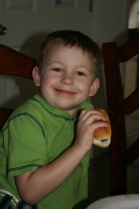 Benjamin enjoying a hotdog Benjamin enjoying a hotdog